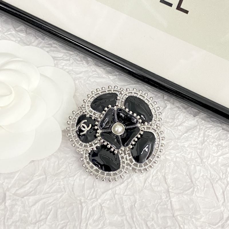 Ch**el brooches